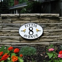 O16 cast metal garden sign
